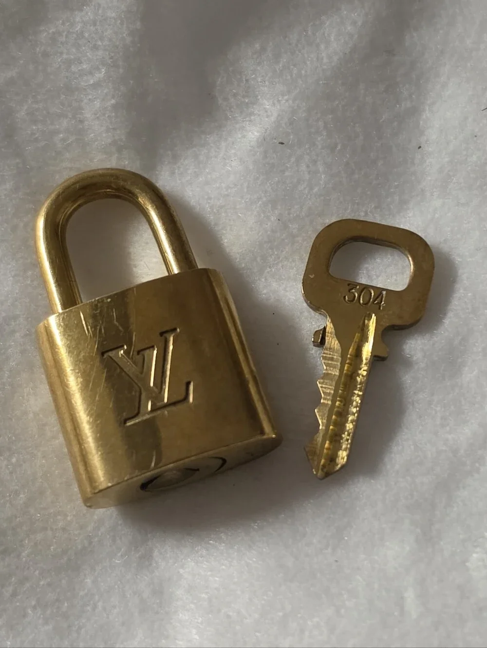 Louis Vuitton Gold-Tone Padlock and Key Set # 304